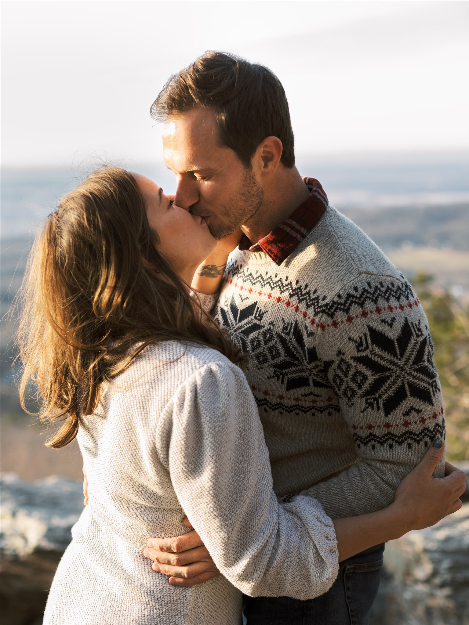 winter engagement session in cozy sweaters