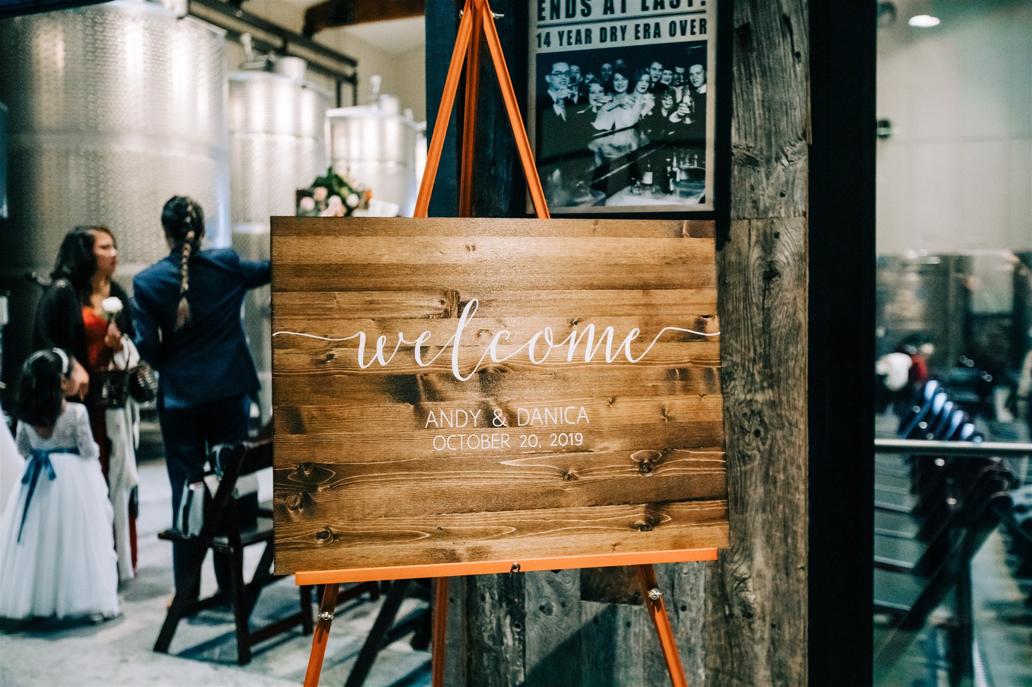 wooden welcome sign for Winery at Bull Run wedding ceremony