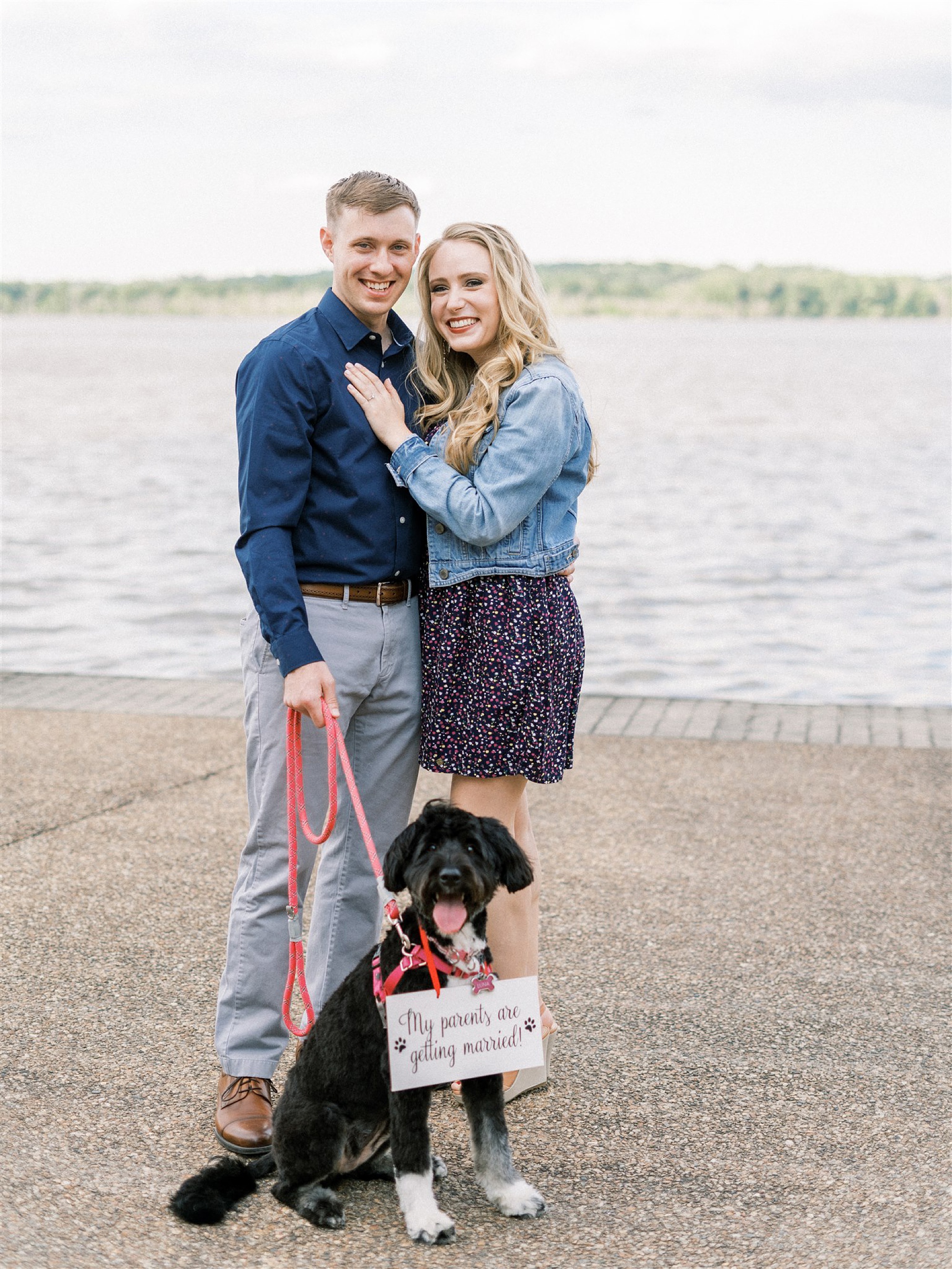 waterfront Old Town Alexandria engagement session with couple and their puppy