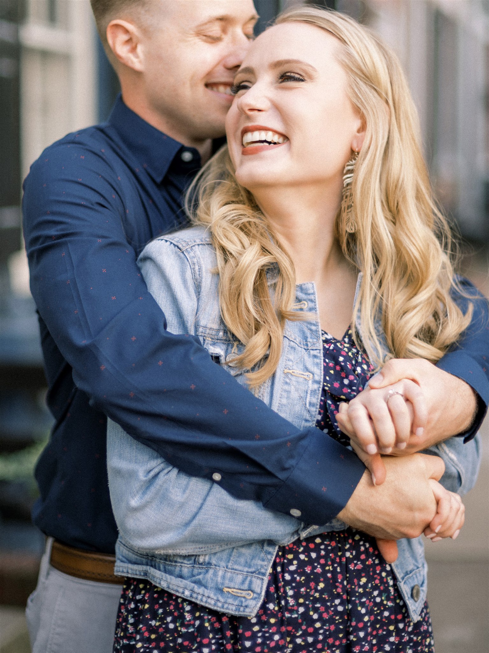 engaged couple hugs during Old Town Alexandria engagement session