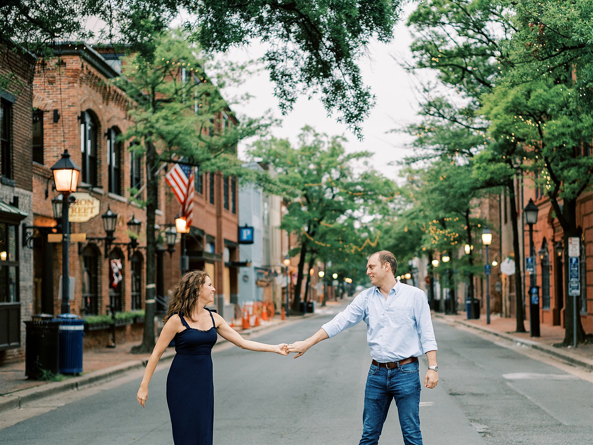 romantic engagement session on street in Old Town Alexandria