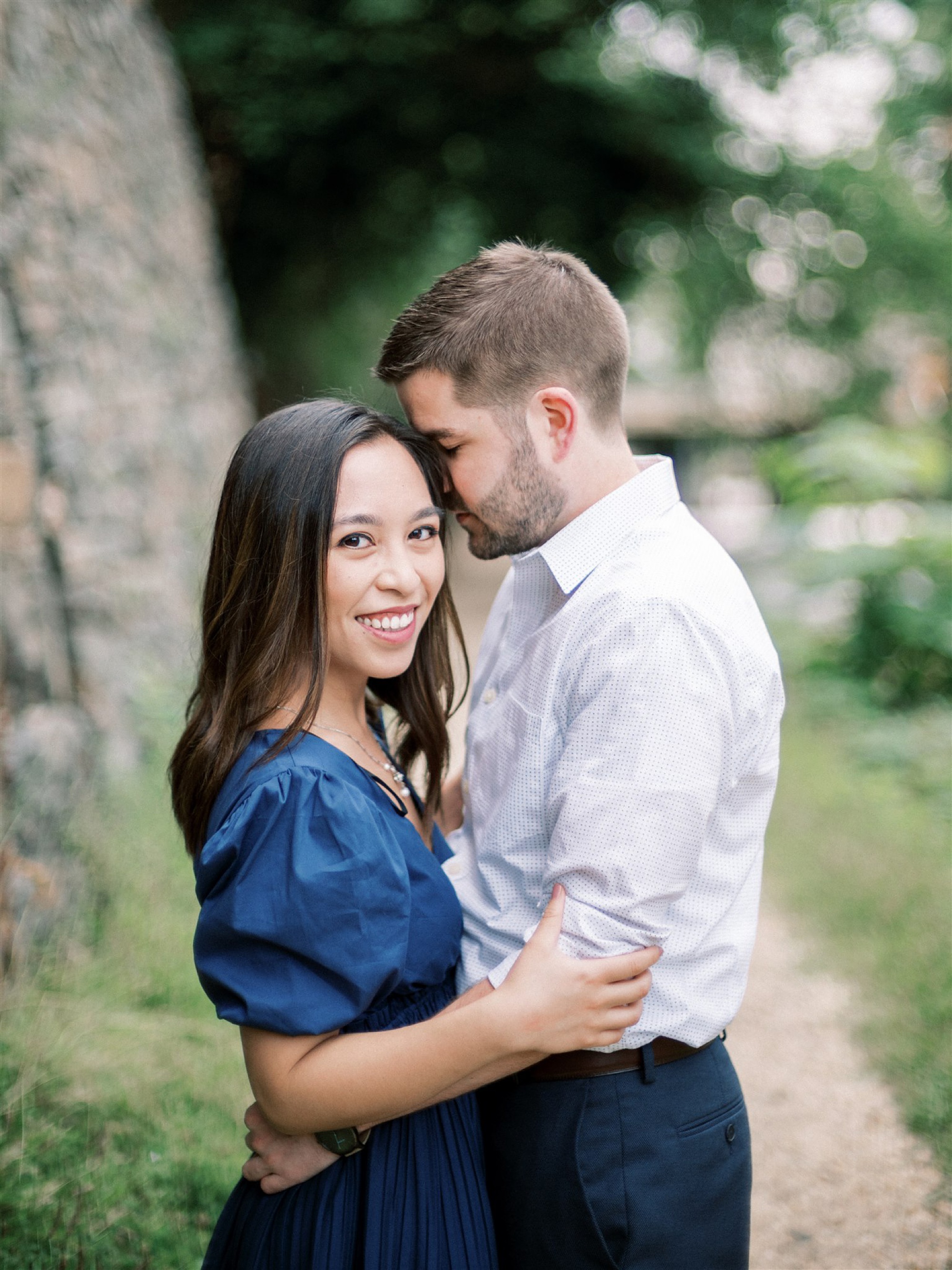 groom nuzzles bride's forehead during Georgetown DC Engagement Session