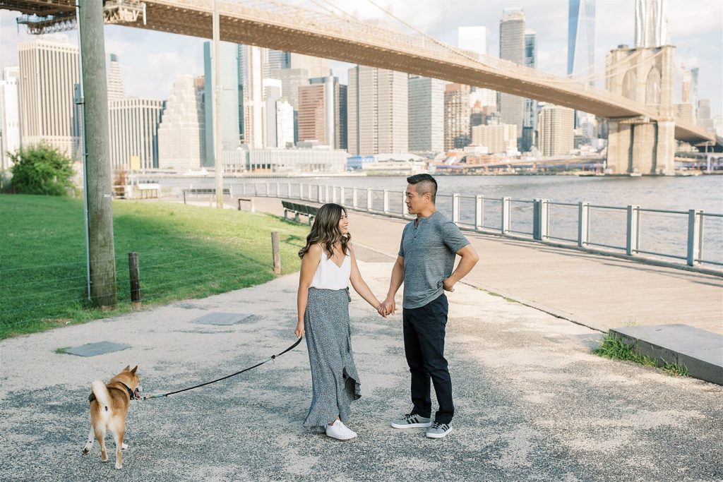 boyfriend reaches for ring during Surprise NYC Proposal