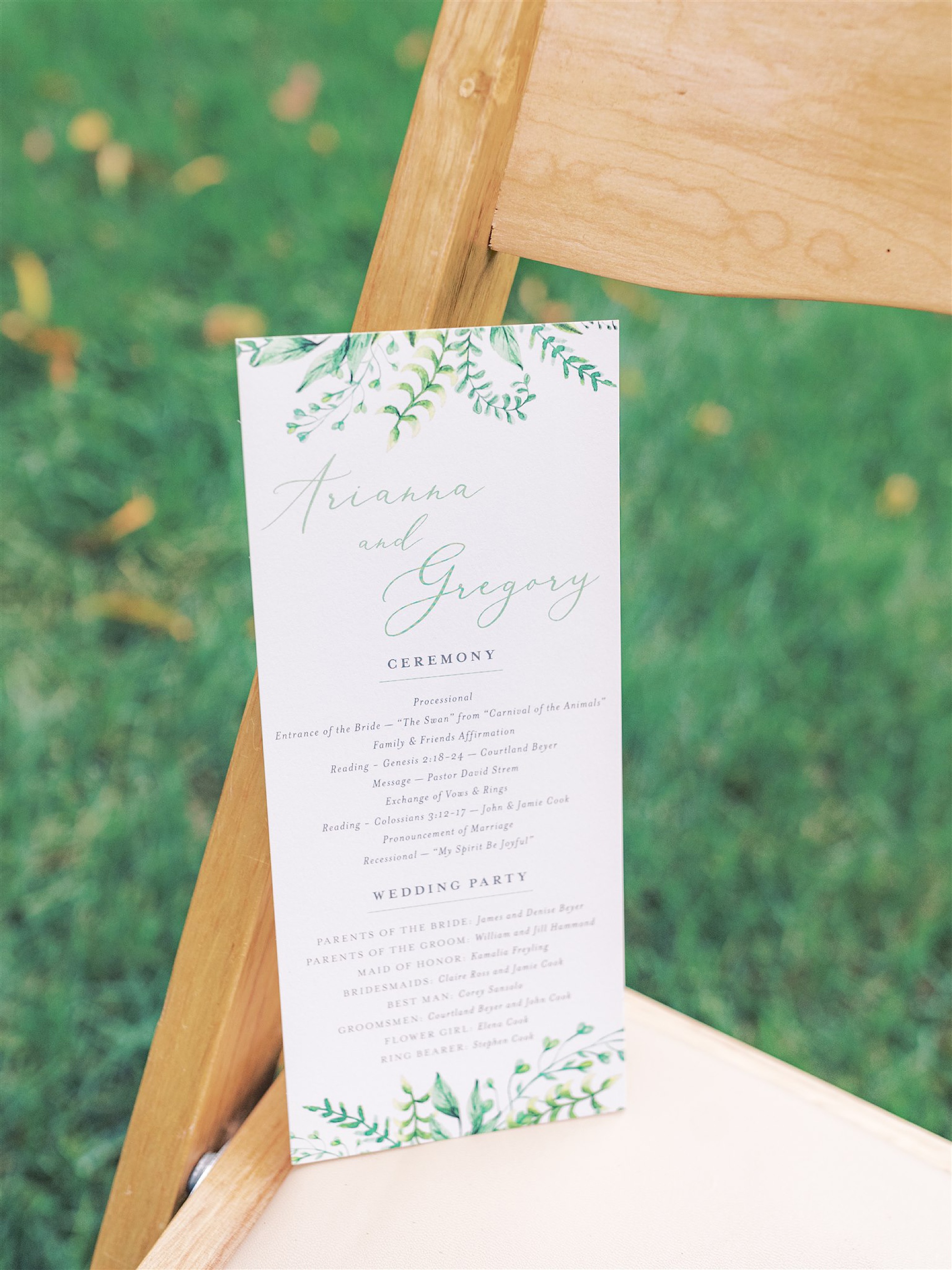 program with green leaves and watercolor paints for outdoor fall wedding ceremony at Mt Defiance Cidery