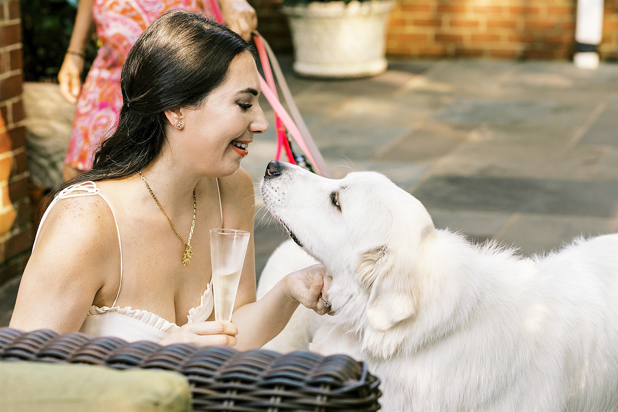 bride snuggles with dog during VA wedding photos